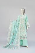 Light green embroidered outfit on a mannequin with a garden background