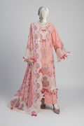 Mannequin wearing a pink embroidered outfit with a garden background