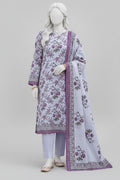 A three-piece women's salwar kameez suit set in light lavender, featuring purple and green floral embroidery, displayed on a female mannequin in an outdoor architectural setting.