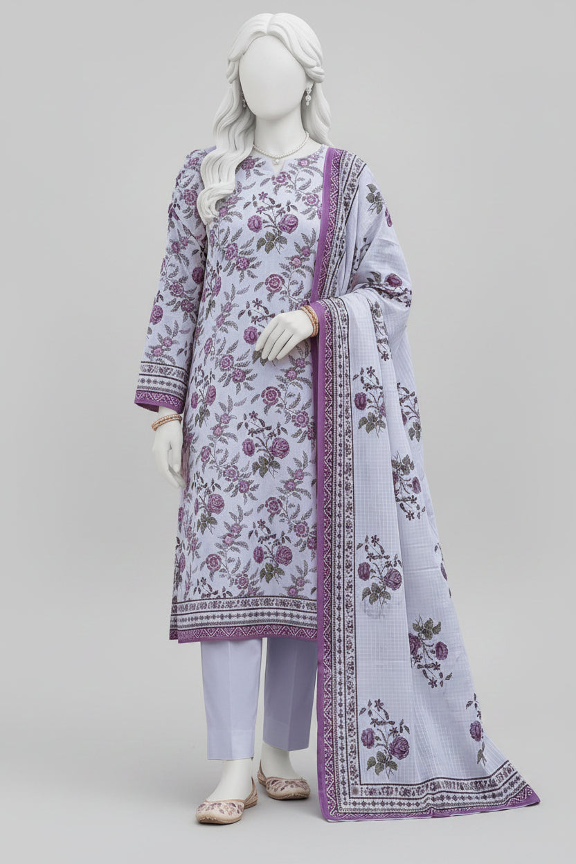 A three-piece women's salwar kameez suit set in light lavender, featuring purple and green floral embroidery, displayed on a female mannequin in an outdoor architectural setting.