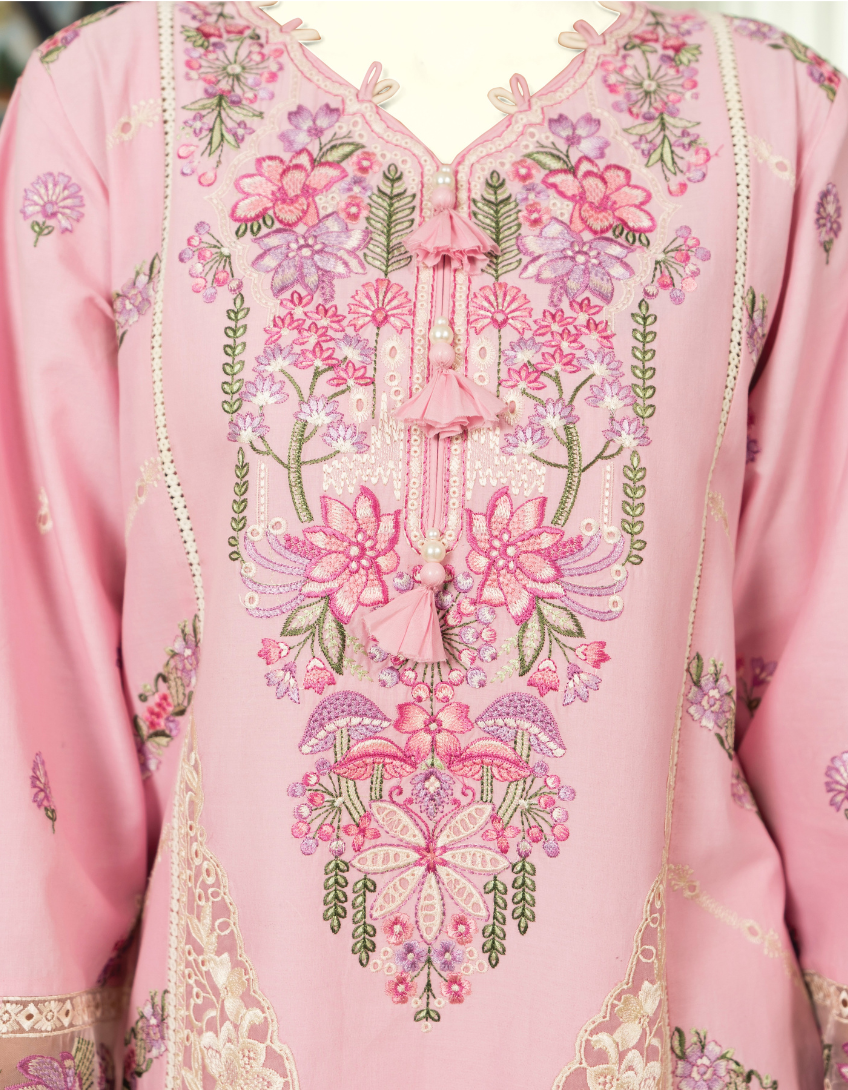 Pink embroidered garment with floral patterns on a plain background