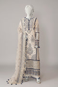 Mannequin wearing a long, patterned dress with a plain background