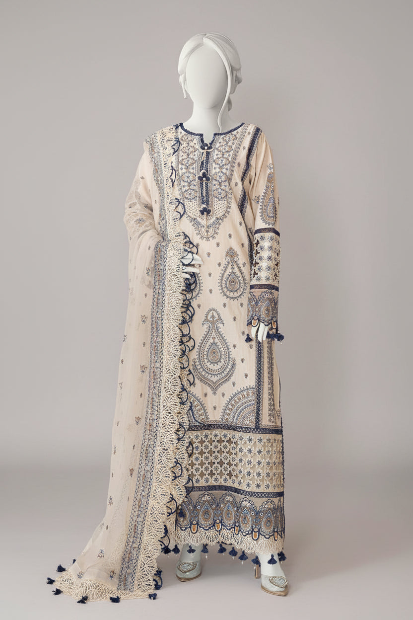 Mannequin wearing a long, patterned dress with a plain background