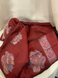 Deep red woven jacquard lawn scarf with floral motifs and decorative border