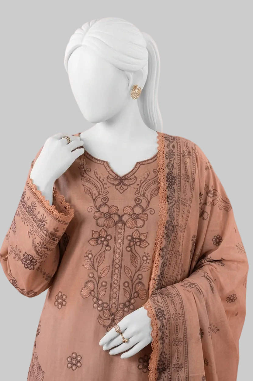 A peach-colored embroidered kurta set with a matching dupatta, displayed on a white female mannequin against a solid pink background.